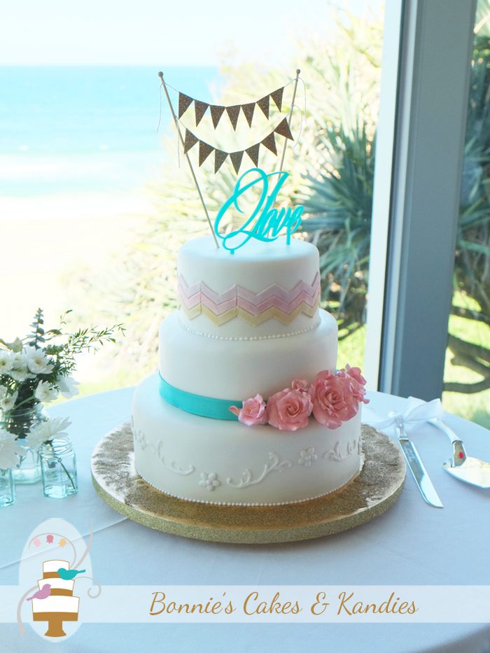 Glittering golden sand, perfect weather, and a custom designed beach wedding cake  |  Bonnie’s Cakes & Kandies